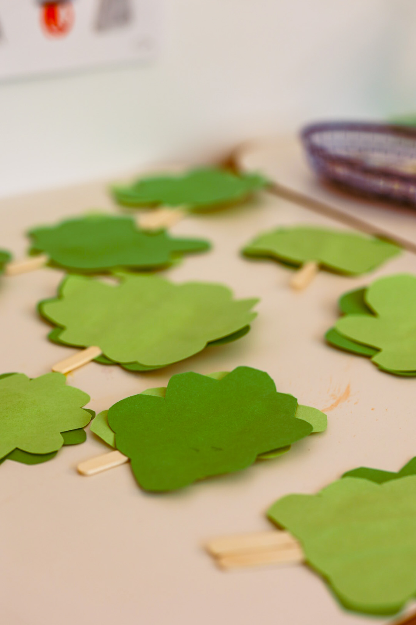 craft trees made with paper and popsicle sticks
