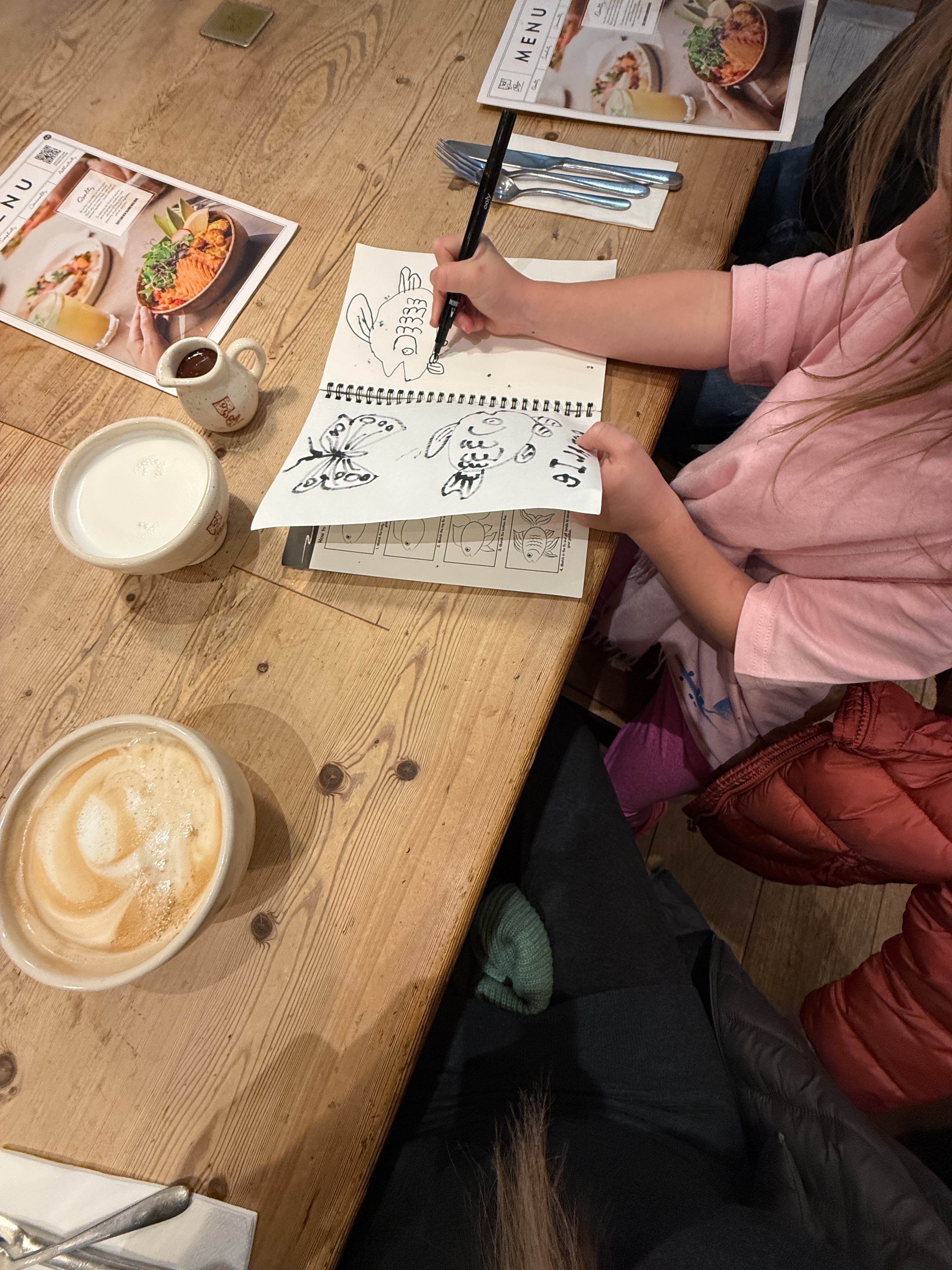 coloring at a cafe in Paris, kids